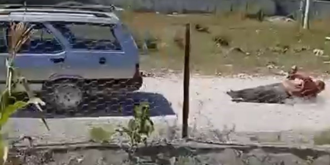 Köpeğine Zarar Veren Adamı Otomobile Bağlayıp 150 Metre Sürükledi