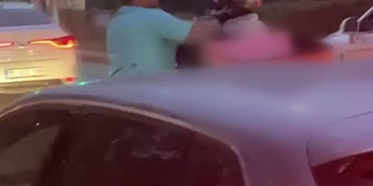 Tartıştığı Motokuryeyi Cadde Ortasında Yumrukladı