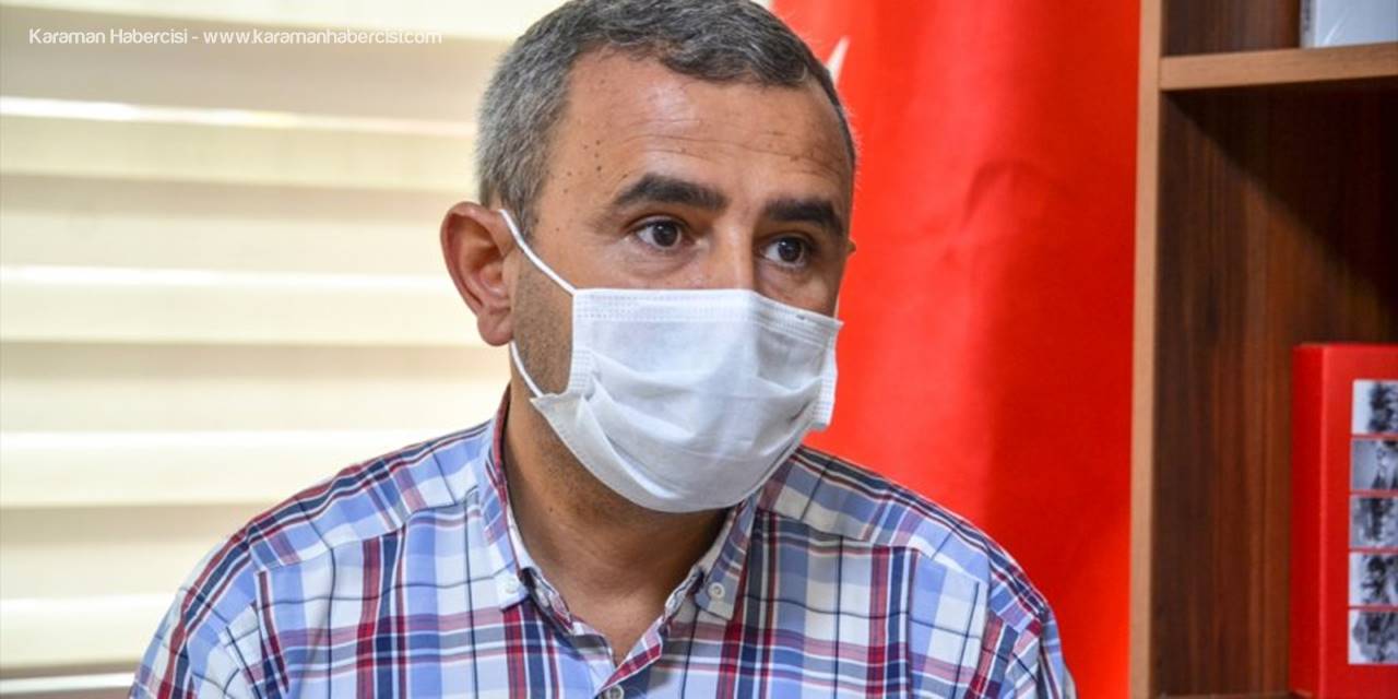 "Koronavirüsle Zorlu Mücadele"nin Simgelerinden Sağlık Çalışanı, AA'nın Yılın Fotoğrafları Oylamasına Katıldı