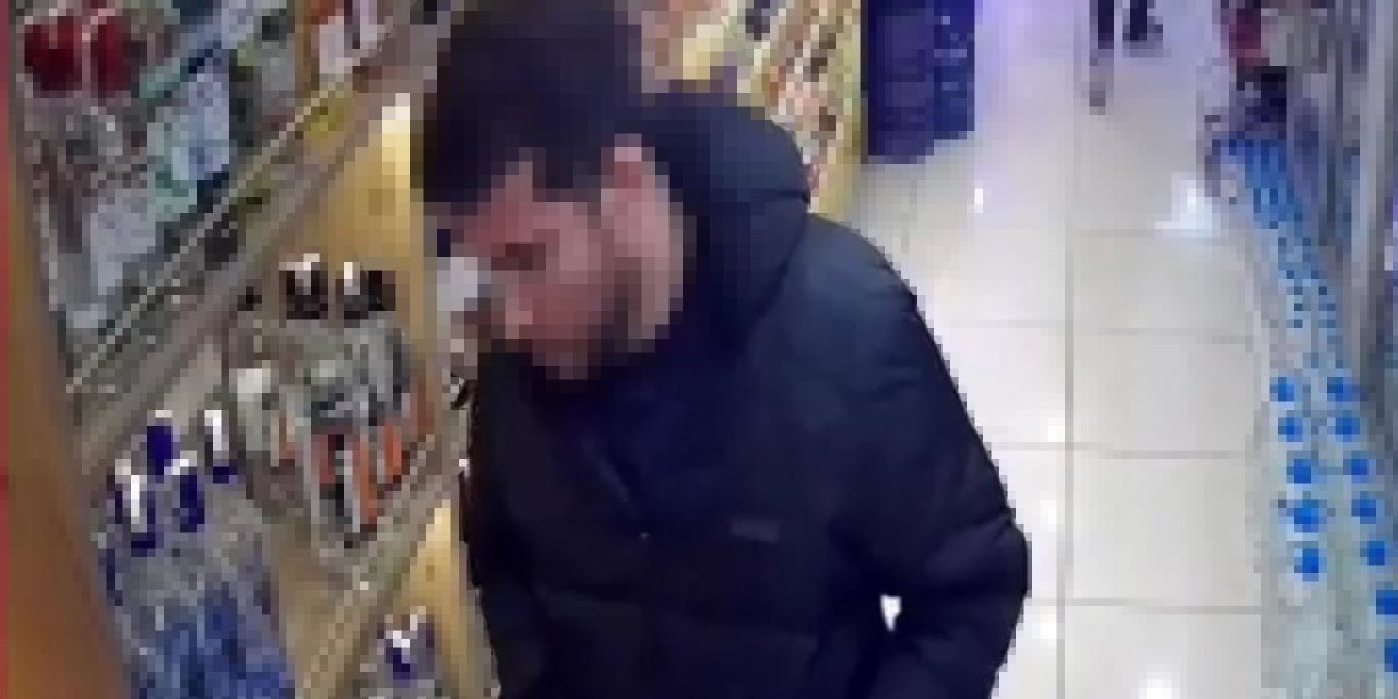 İçki Şişesini Montunun İçine Gizleyerek Çaldı