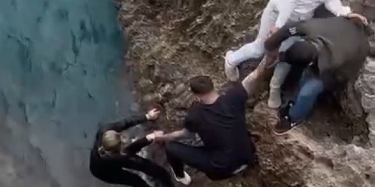 Falezlerden Atlayan Genç Kadını İmece Usulü Kurtardılar